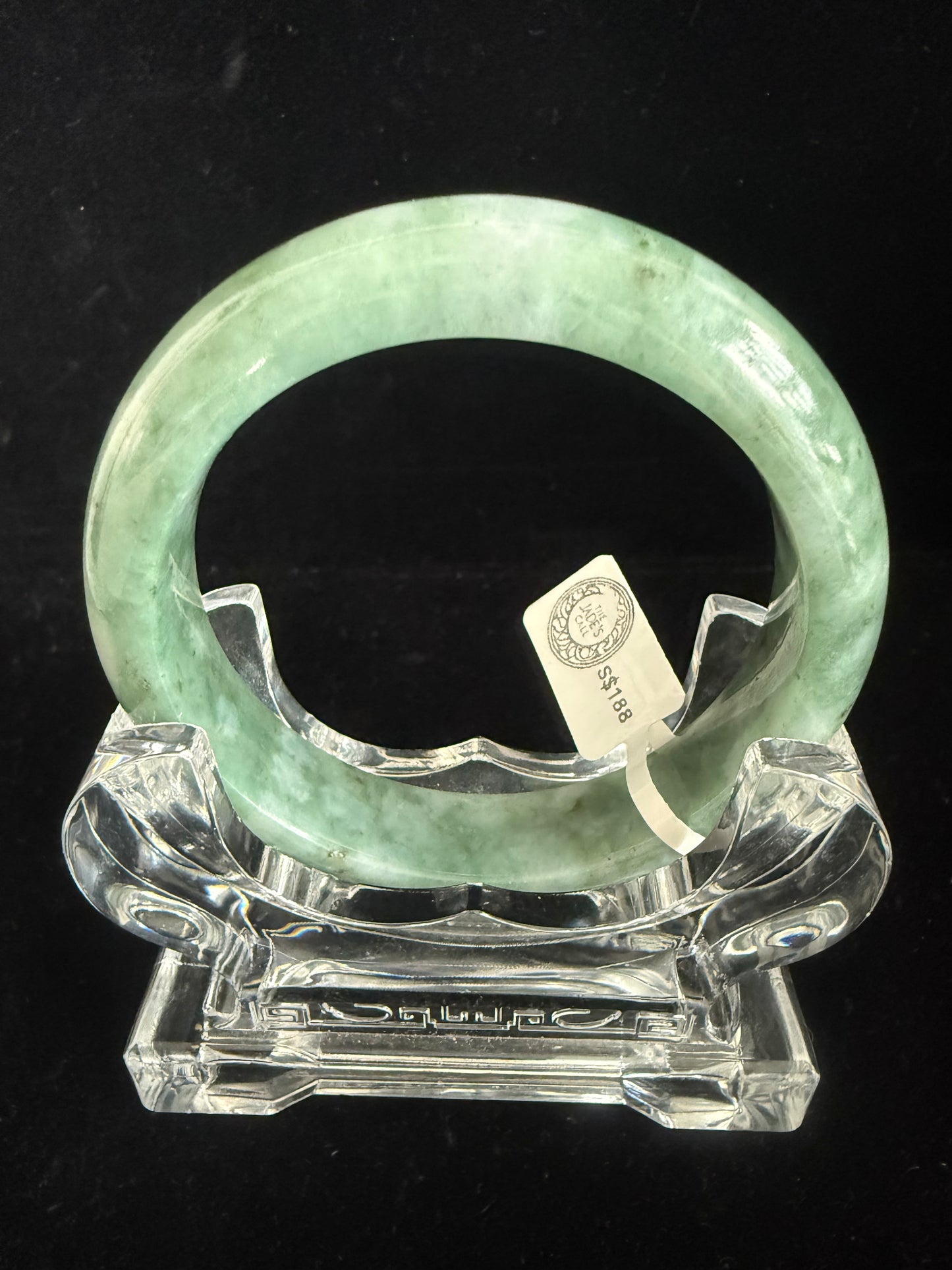 225. White prints on leave green Jade bangle