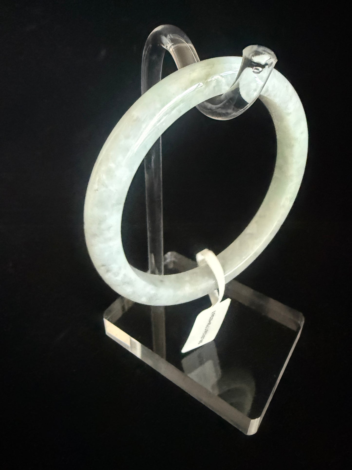 361. Thin light colored Jade bangle