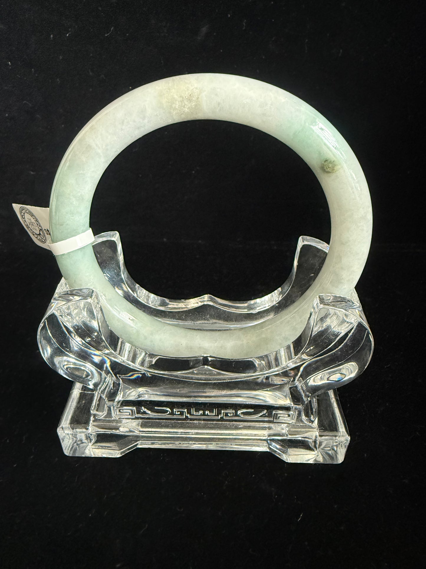 434. Traditional round light green jade bangle