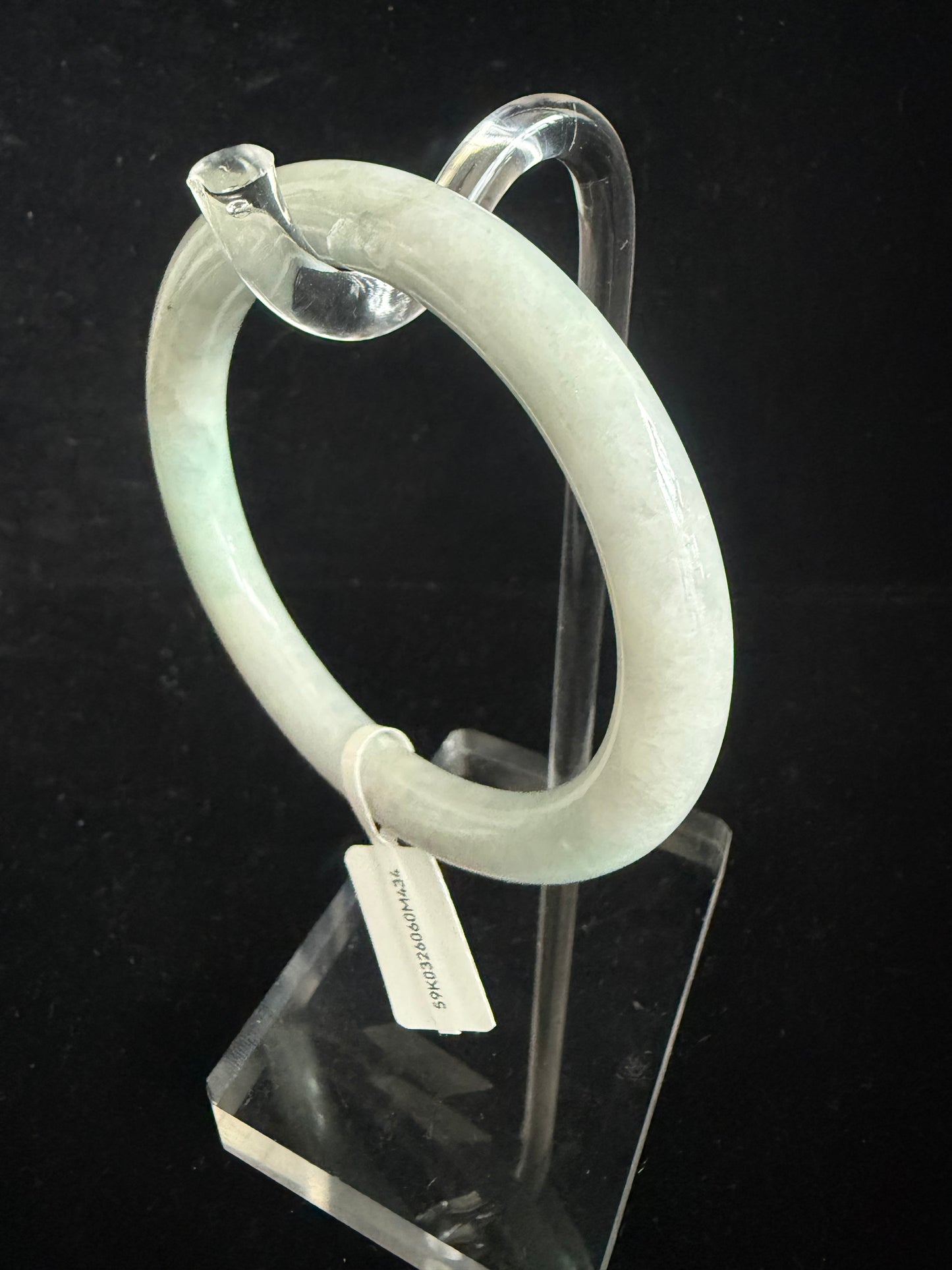 434. Traditional round light green jade bangle