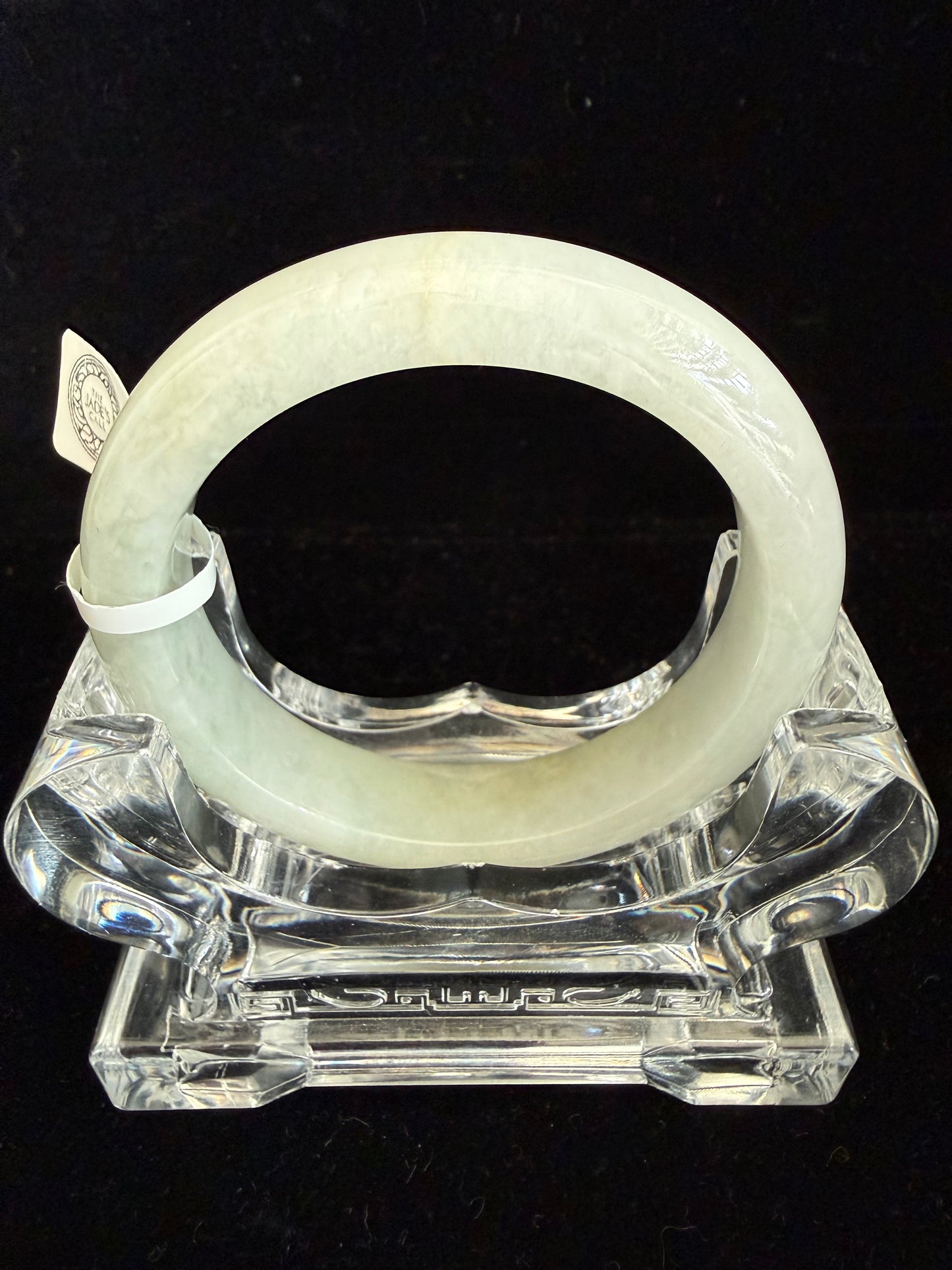 450. Slight yellow tinted Jade Bangle