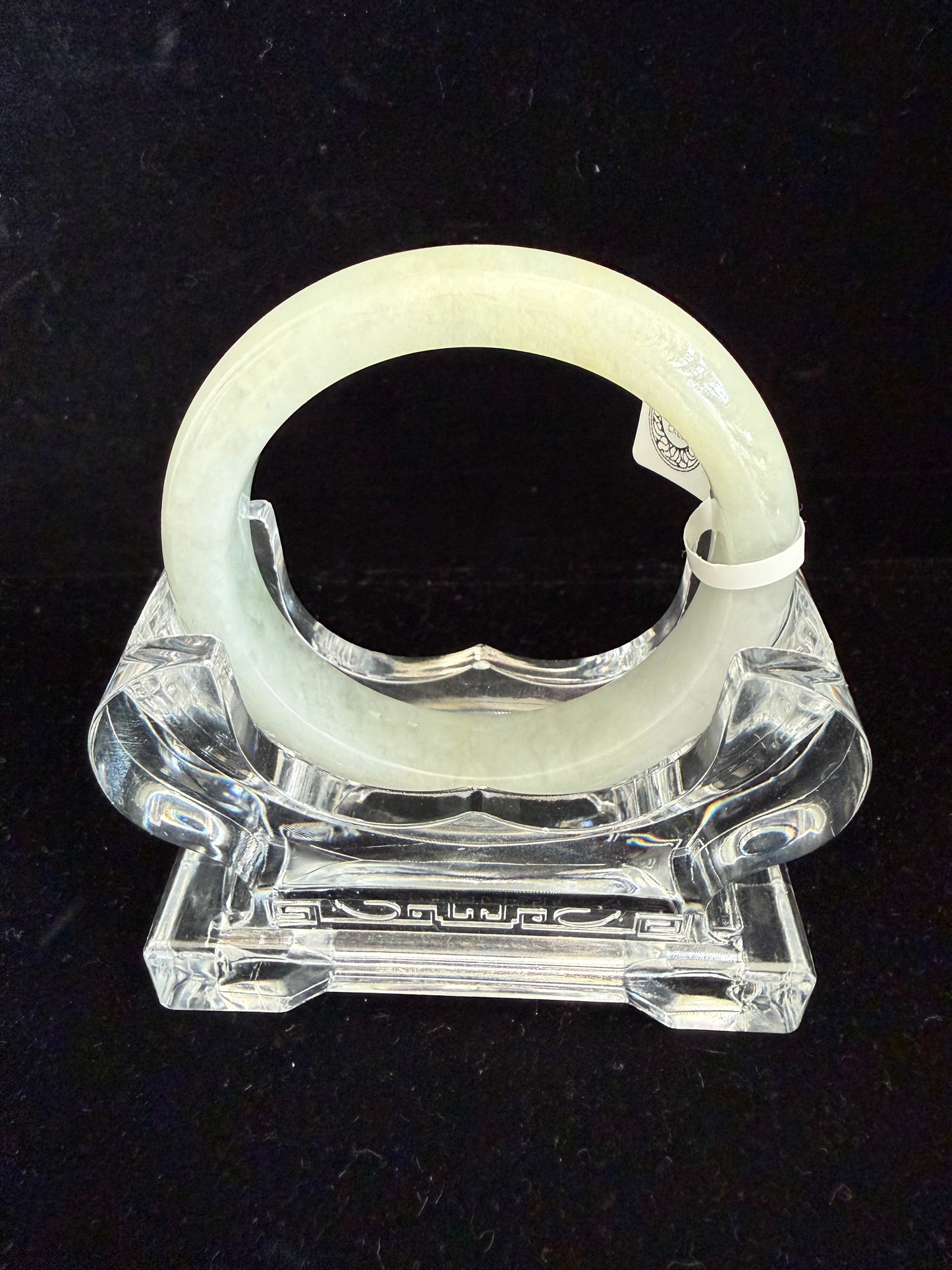 450. Slight yellow tinted Jade Bangle