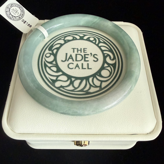 414.  Thin mint-green jade bangle