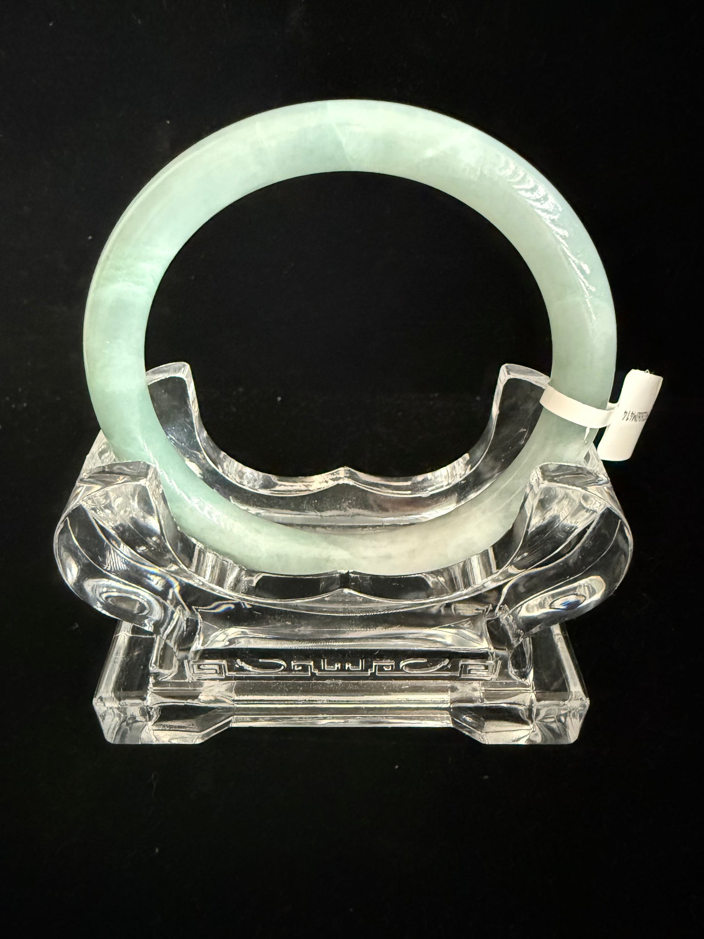414.  Thin mint-green jade bangle
