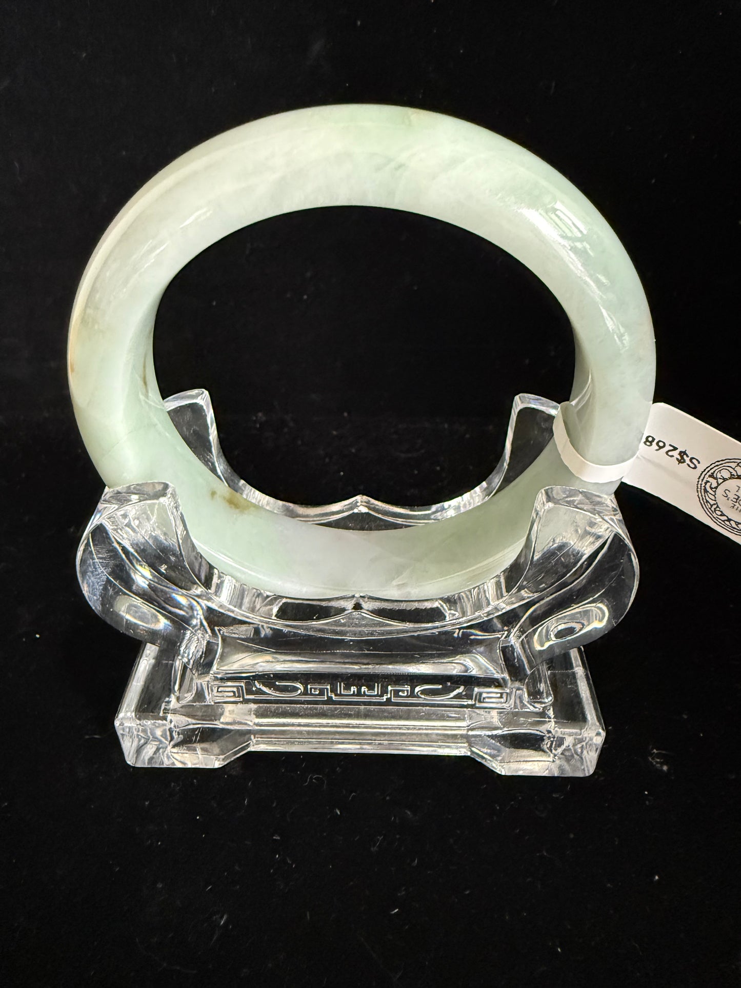 468. Milky pale green with rust spots jade bangle