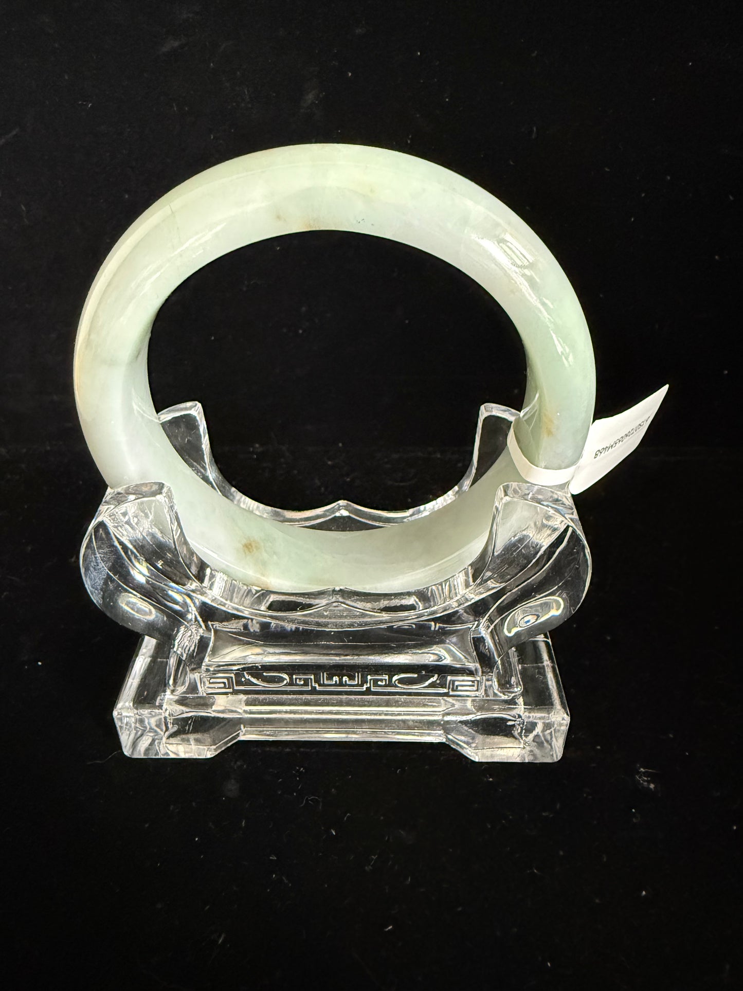 468. Milky pale green with rust spots jade bangle