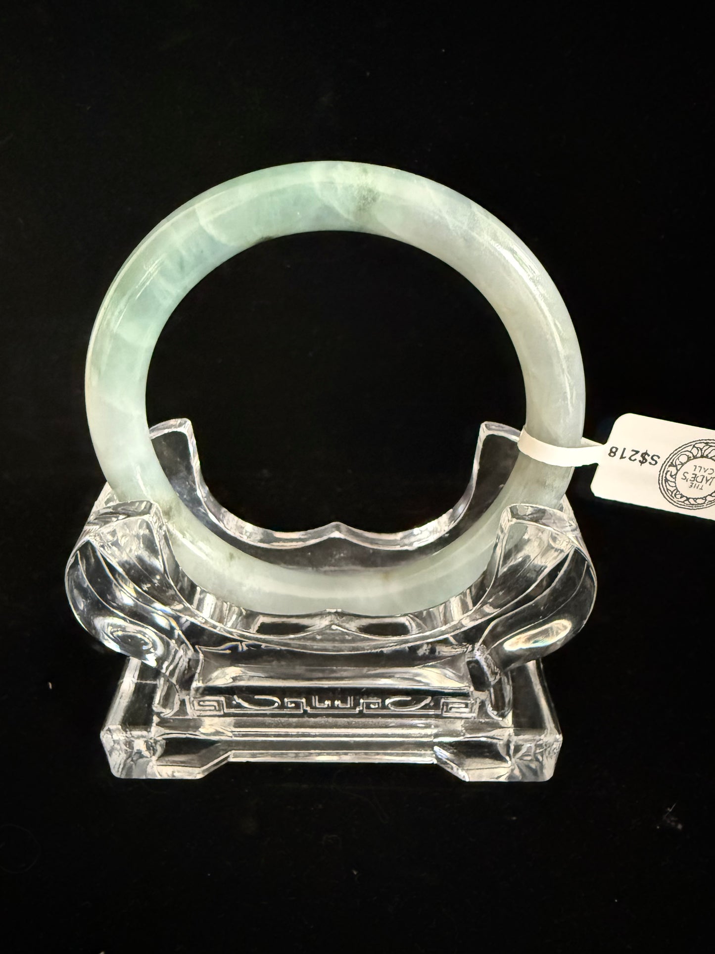 437. Misty green with dark inclusions thin jade bangle