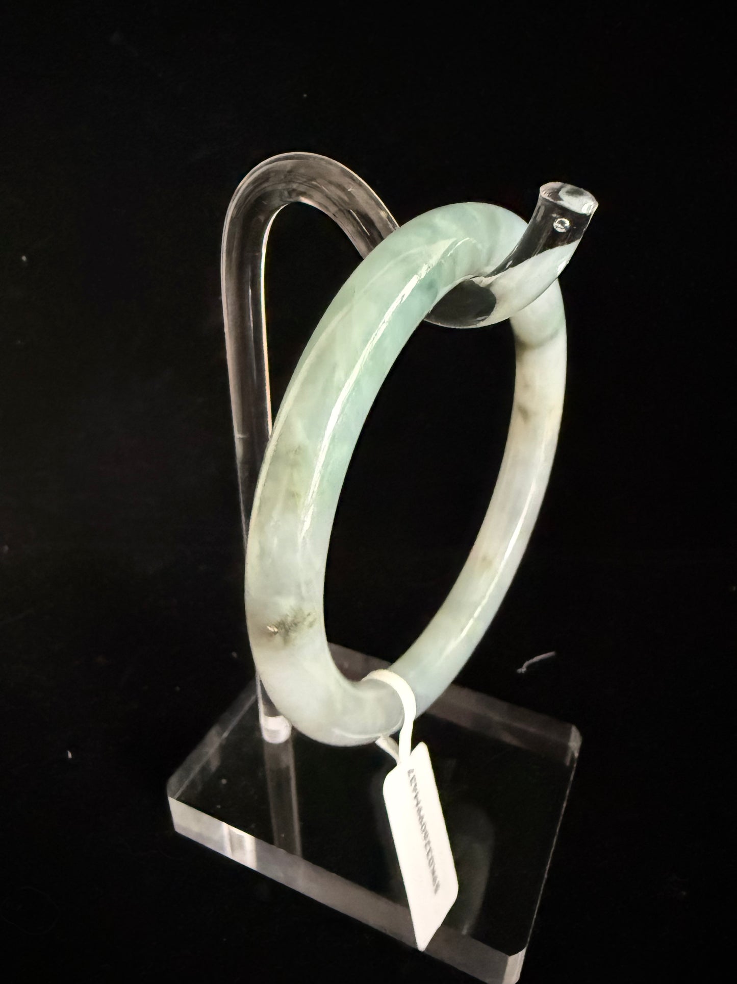 437. Misty green with dark inclusions thin jade bangle