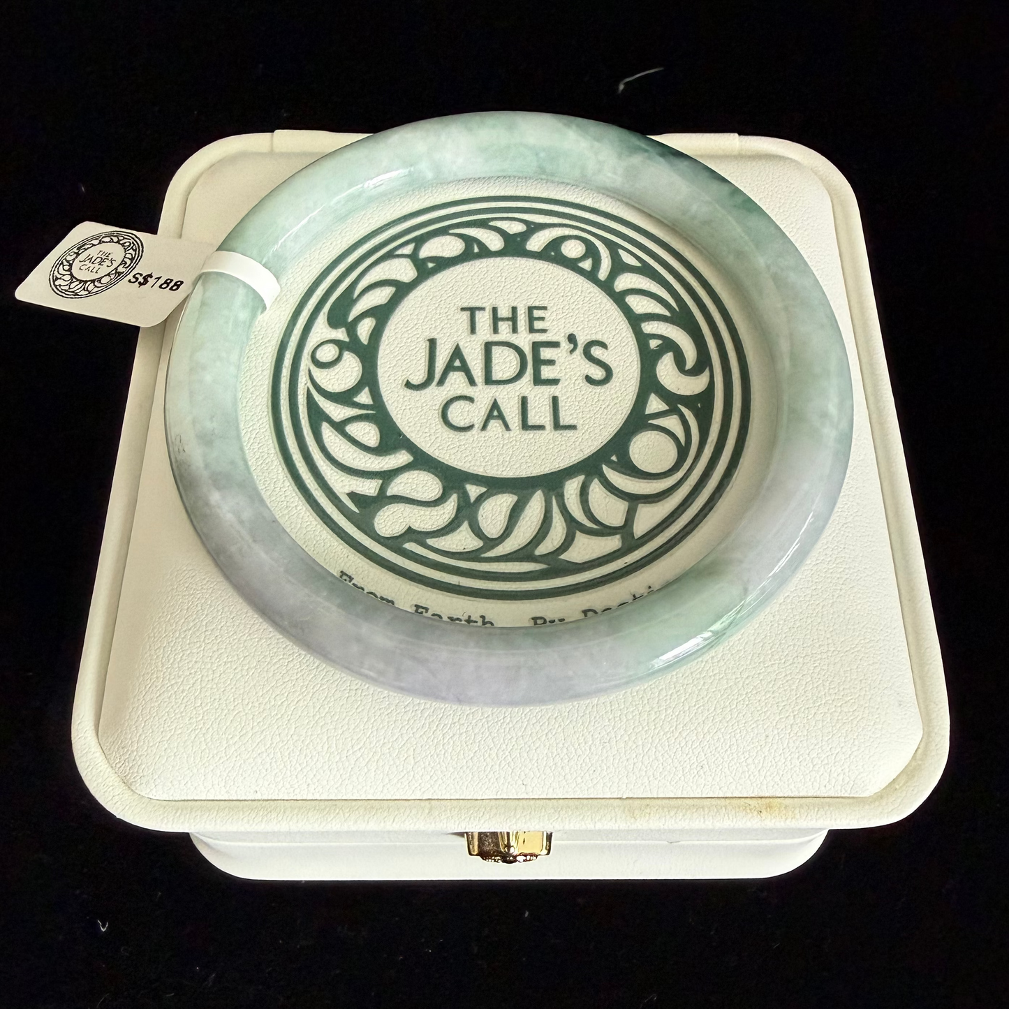 438. Pale mint with green floating patches thin jade bangle