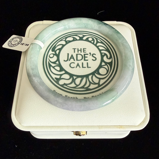 438. Pale mint with green floating patches thin jade bangle