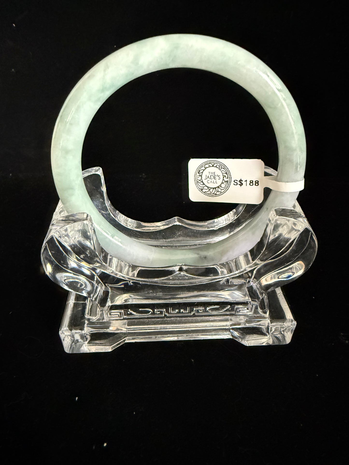 438. Pale mint with green floating patches thin jade bangle