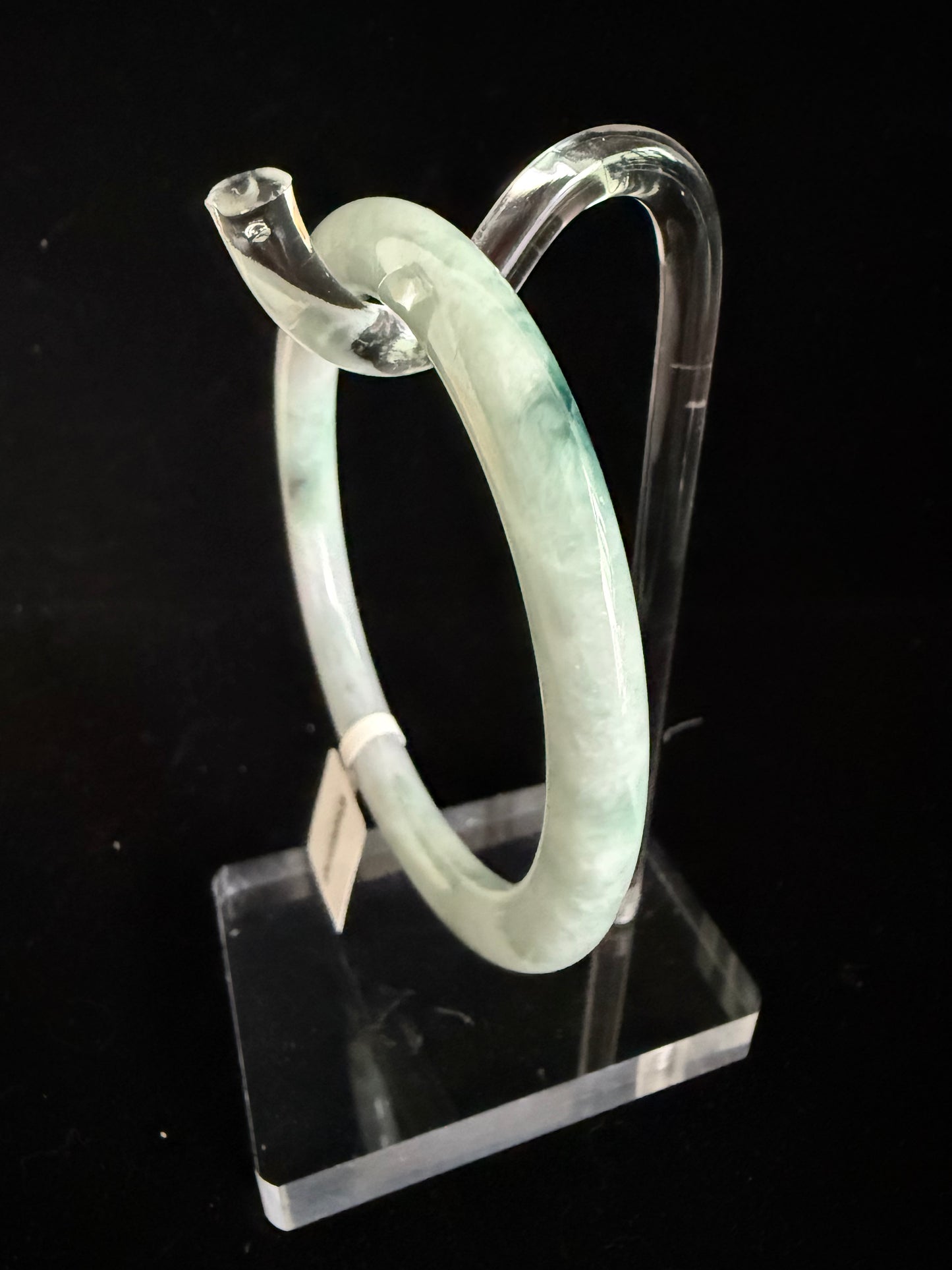 438. Pale mint with green floating patches thin jade bangle