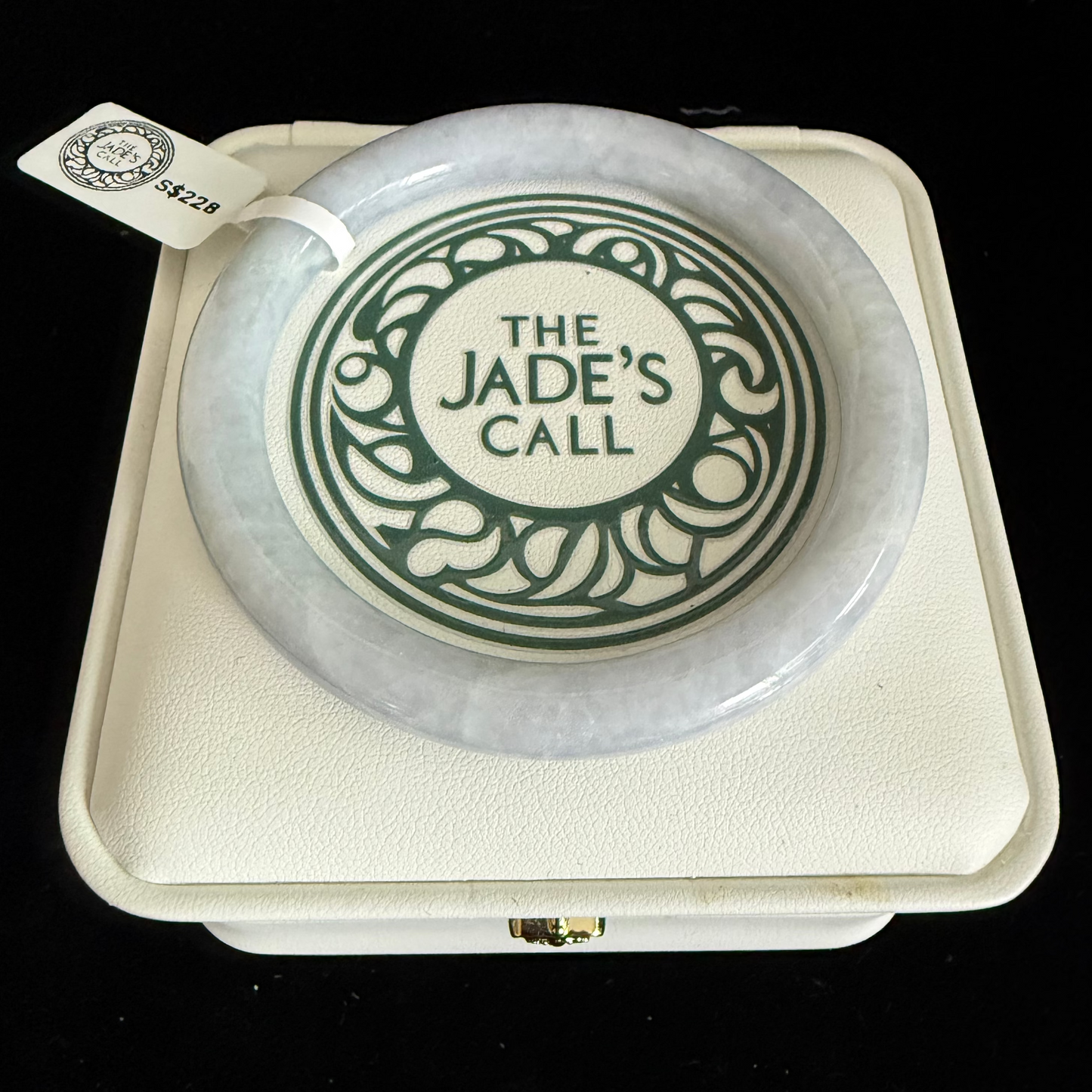 439. Thin white with soft lavender jade bangle