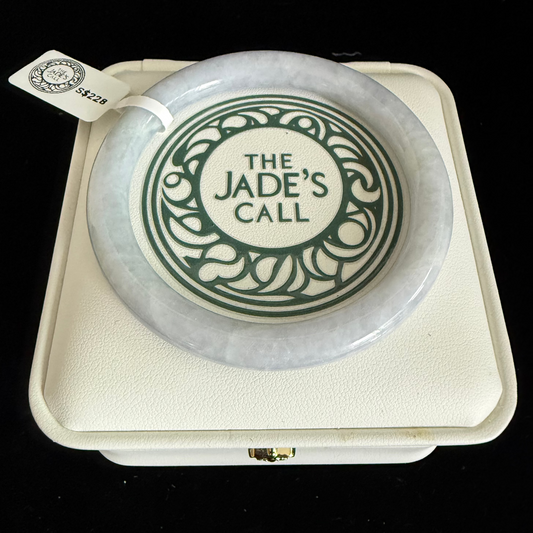 439. Thin white with soft lavender jade bangle