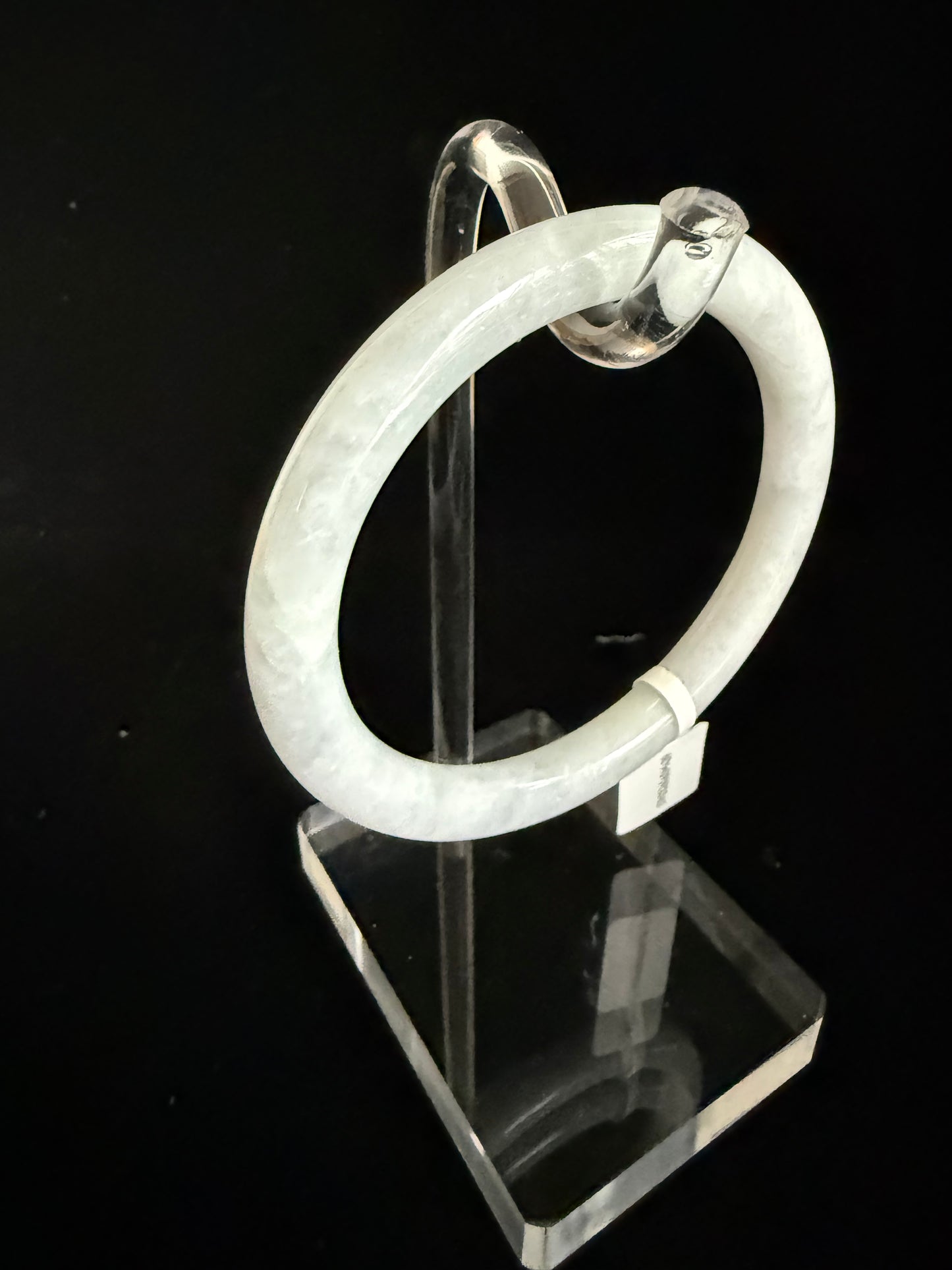 439. Thin white with soft lavender jade bangle