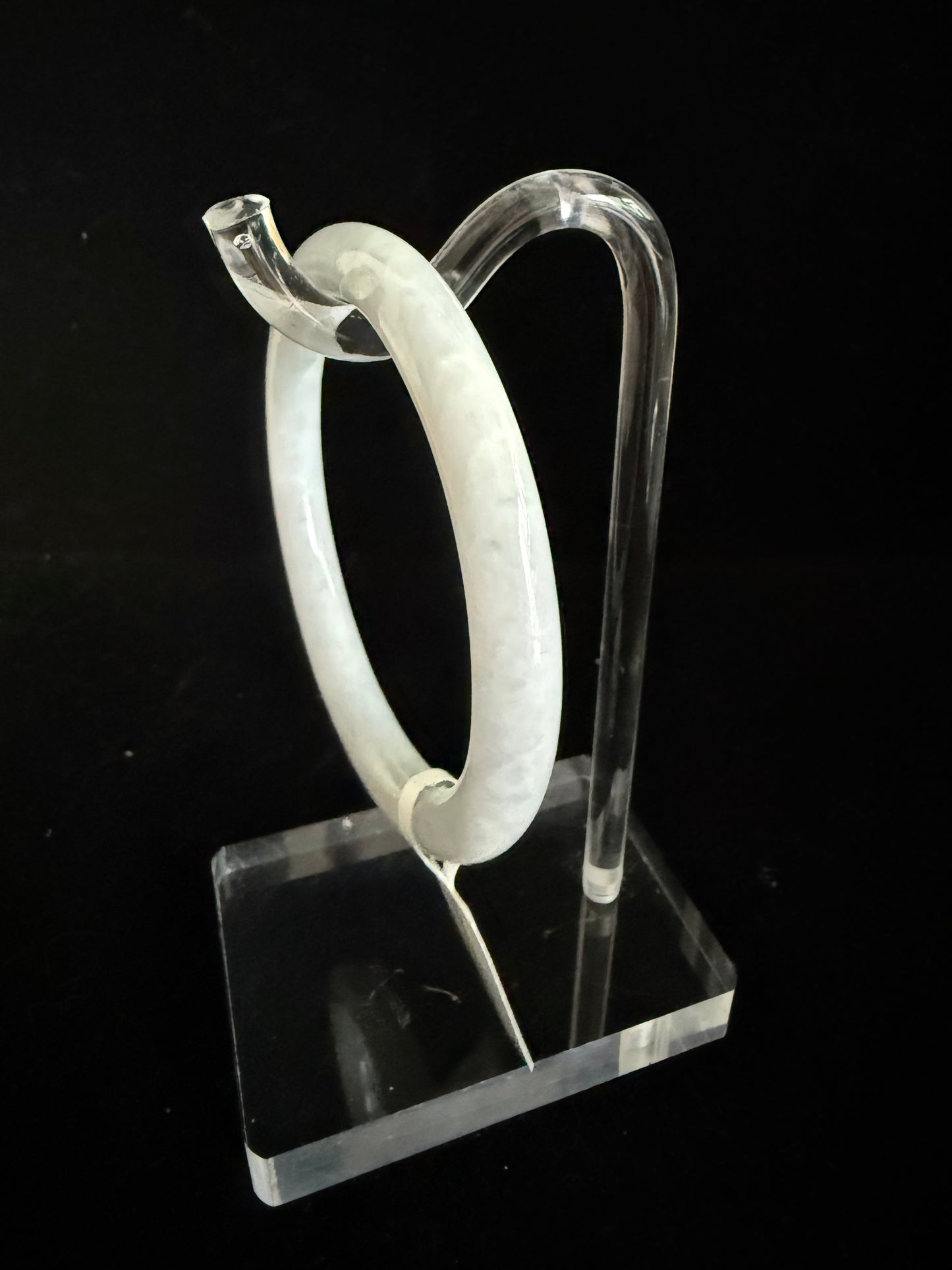439. Thin white with soft lavender jade bangle
