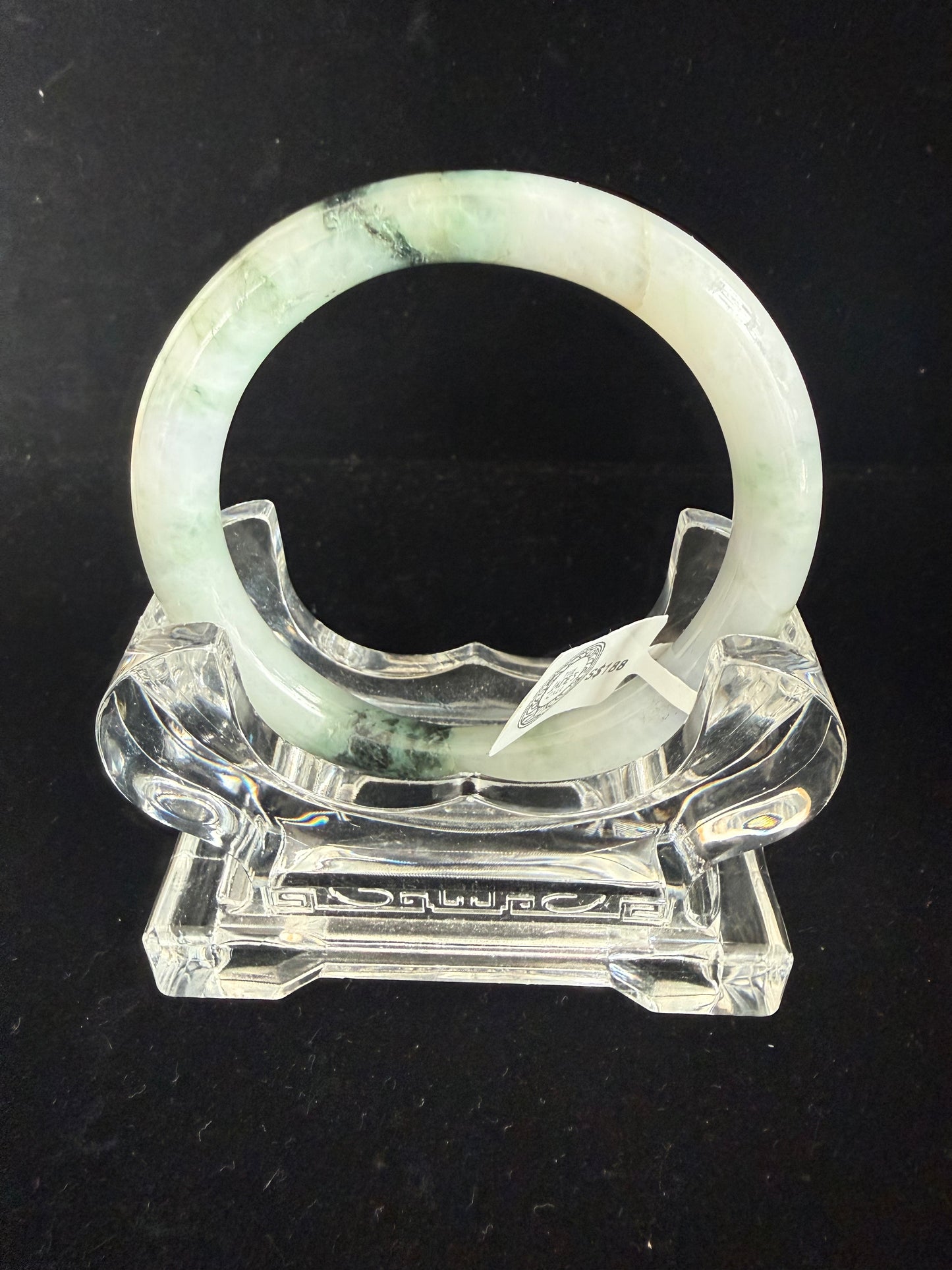 430. White with green and black veins jade bangle