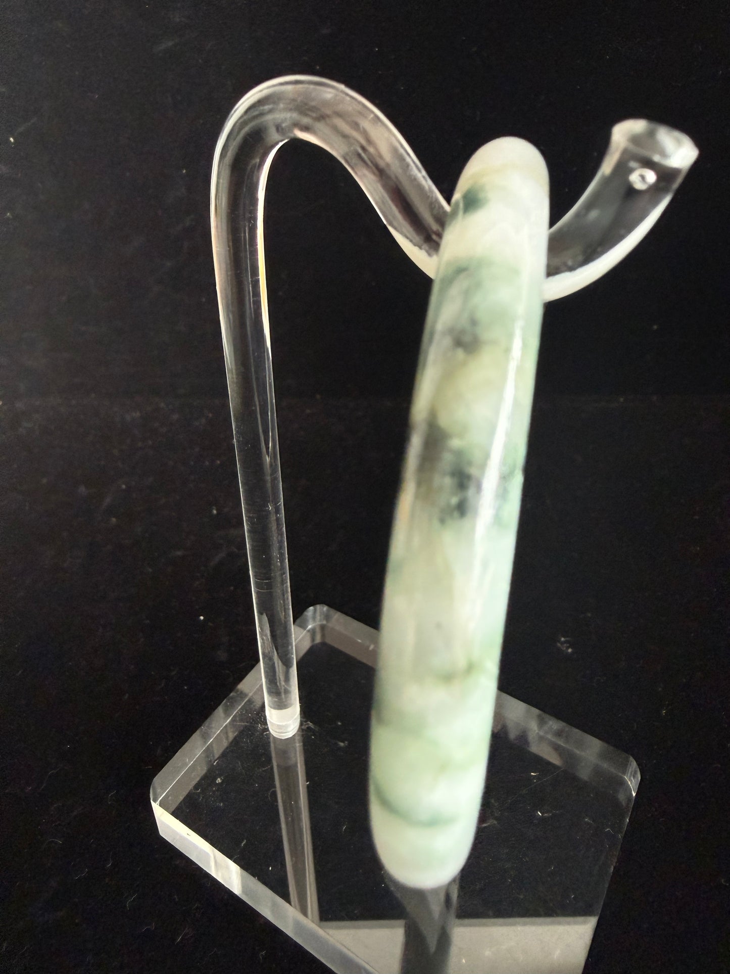 430. White with green and black veins jade bangle