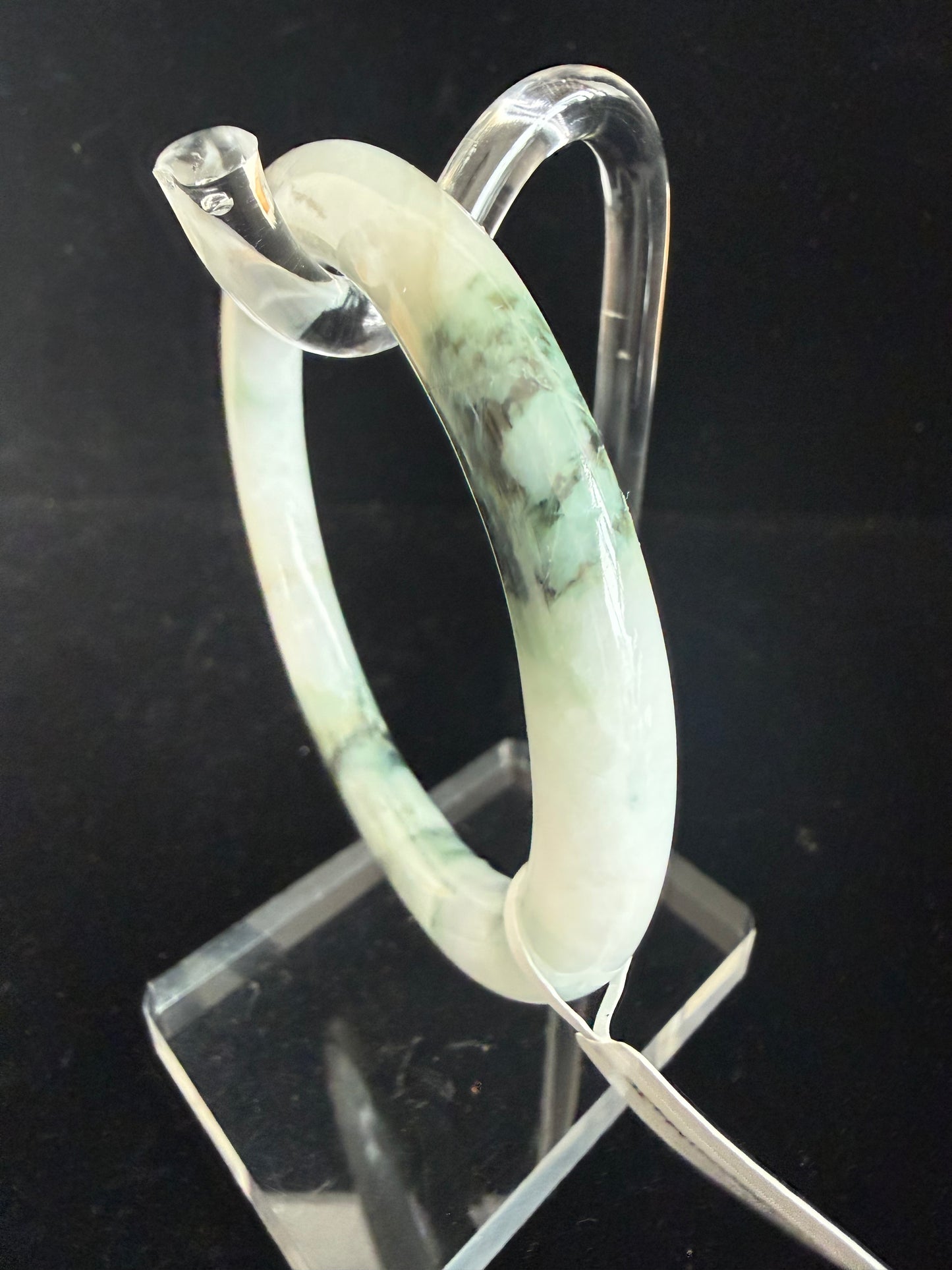 430. White with green and black veins jade bangle