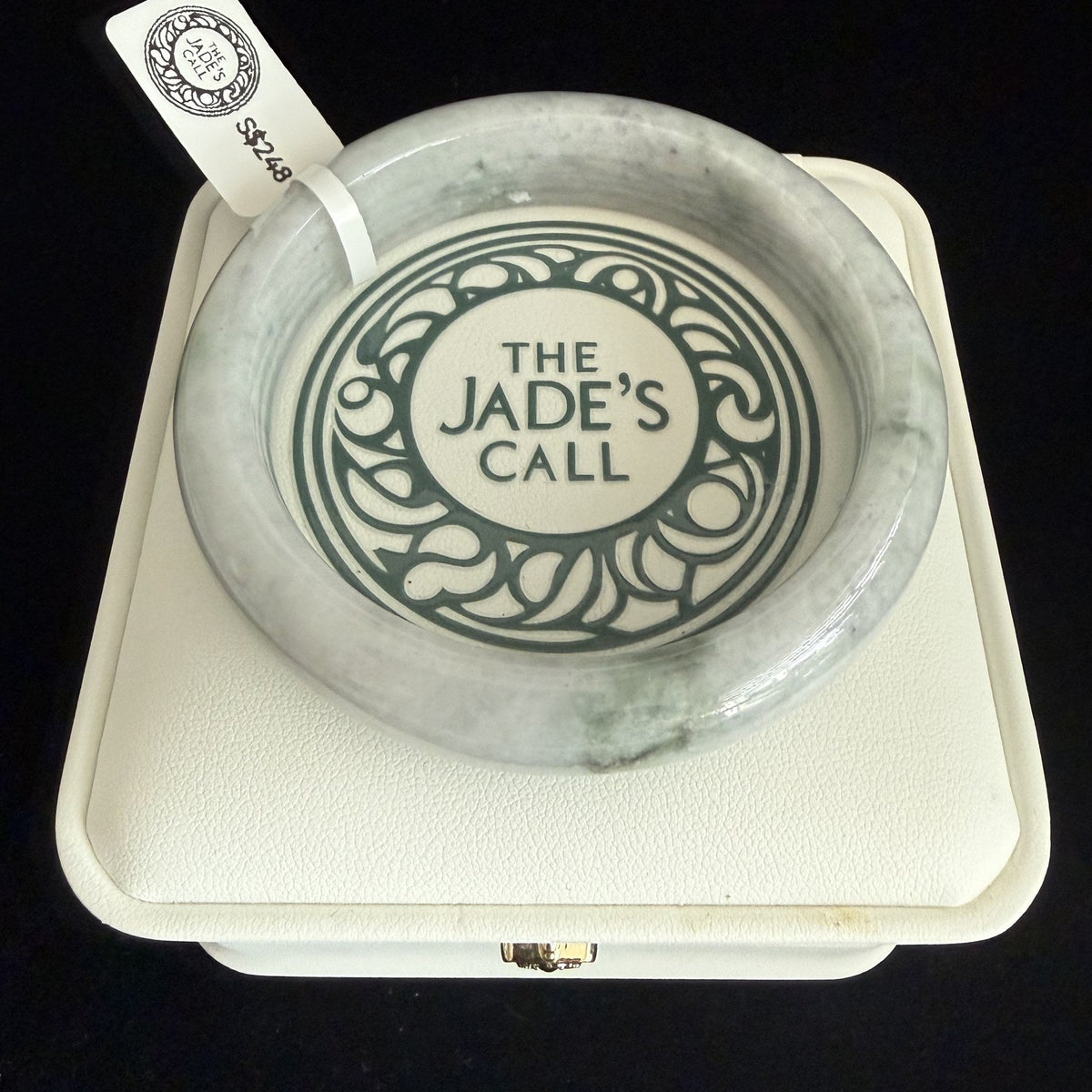 484. White with pale green mottling jade bangle