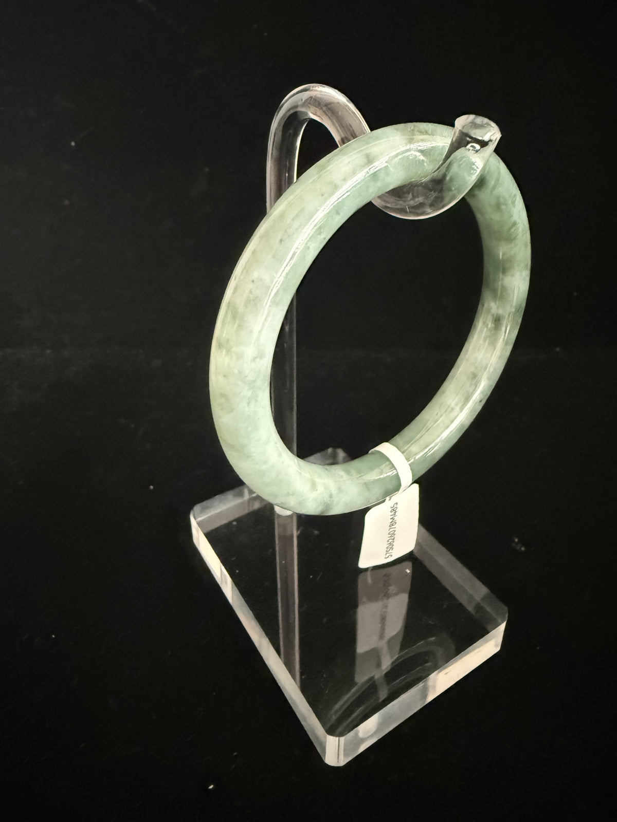 485. Deep grey-green mottled jade bangle
