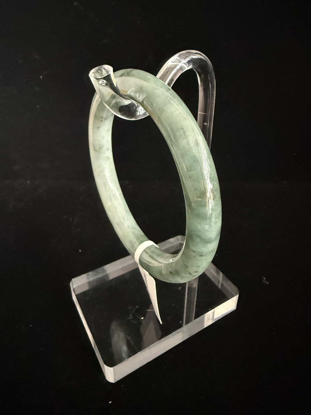 485. Deep grey-green mottled jade bangle