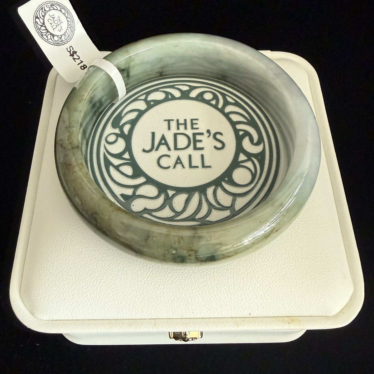 479. Green with golden-brown tones jade bangle
