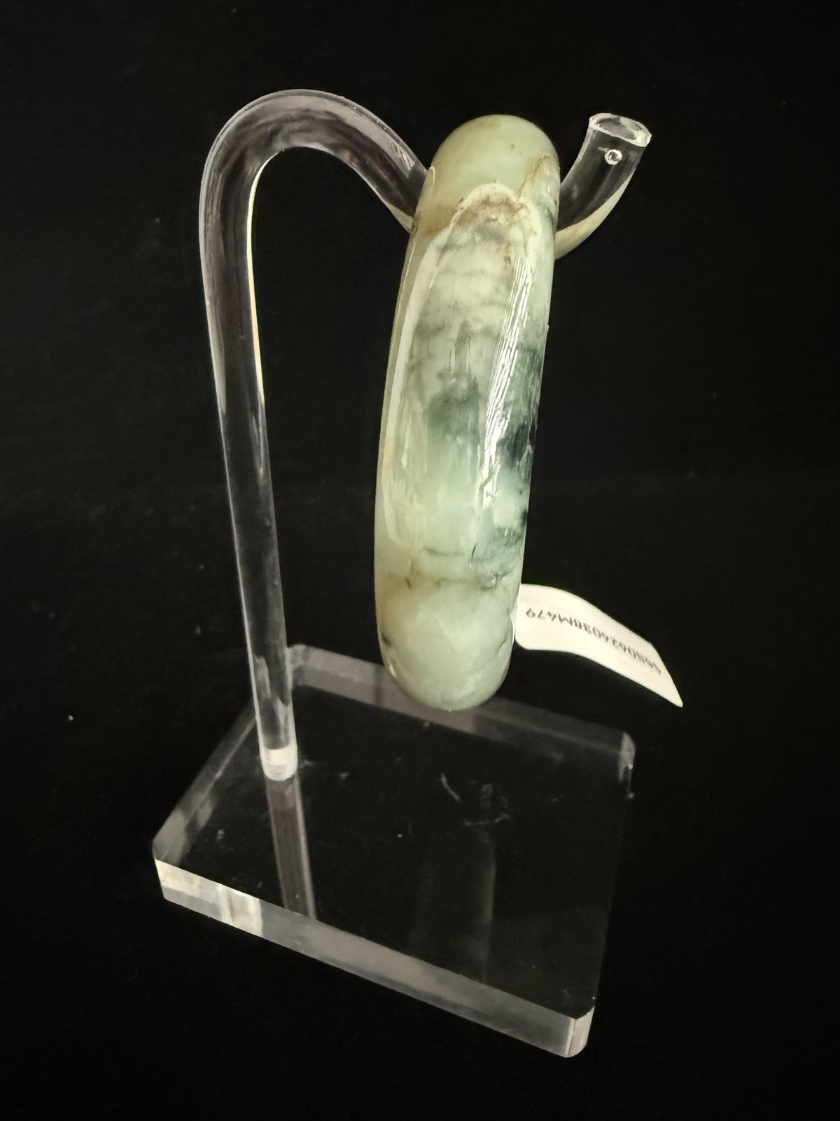 479. Green with golden-brown tones jade bangle