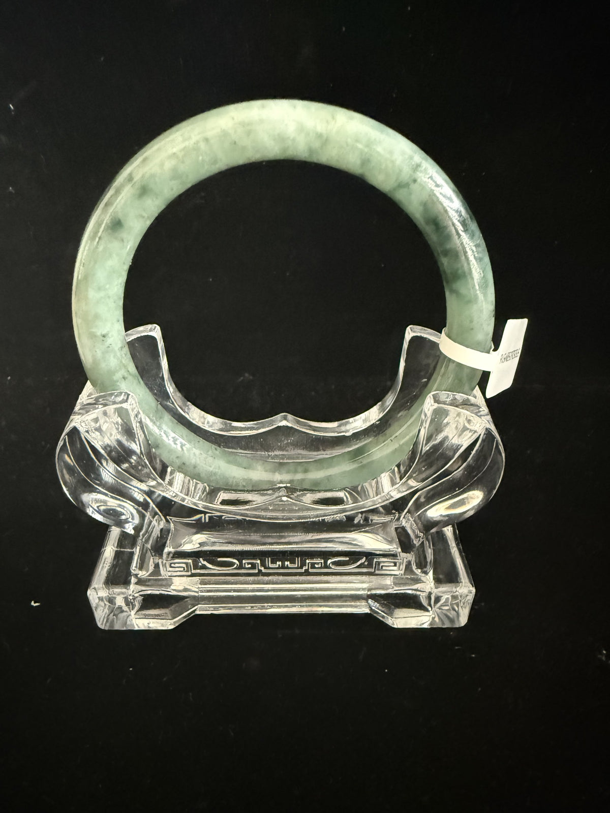 516. Fresh green with dark flecks thin jade bangle