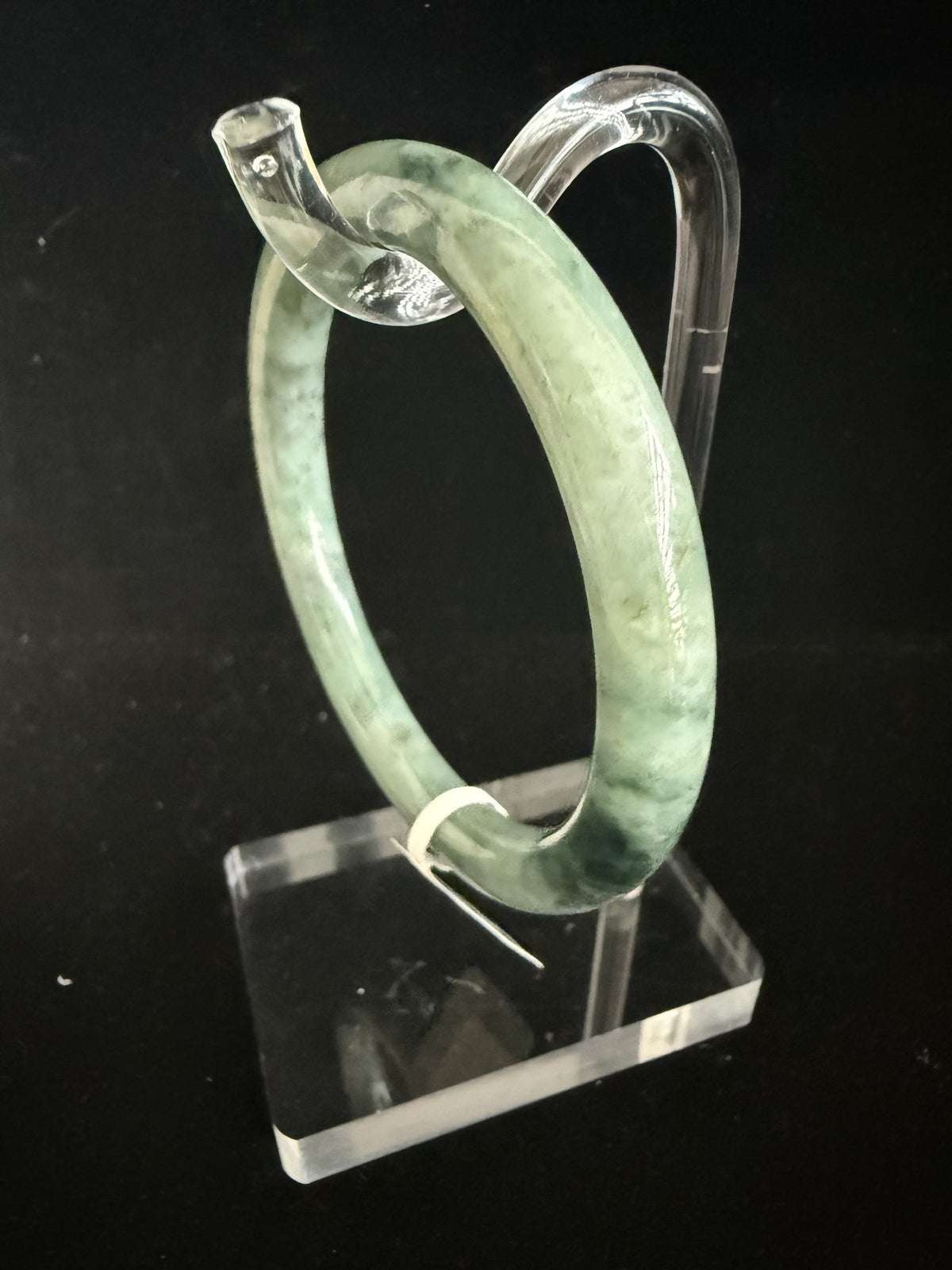 516. Fresh green with dark flecks thin jade bangle