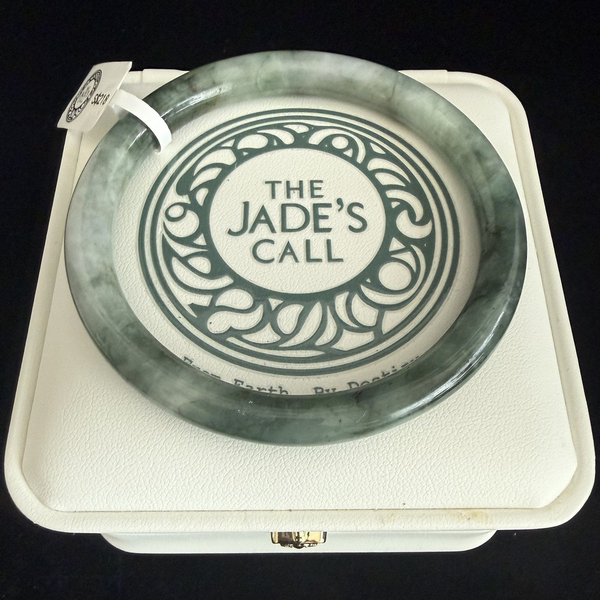 520. Grey-green mottled thin jade bangle
