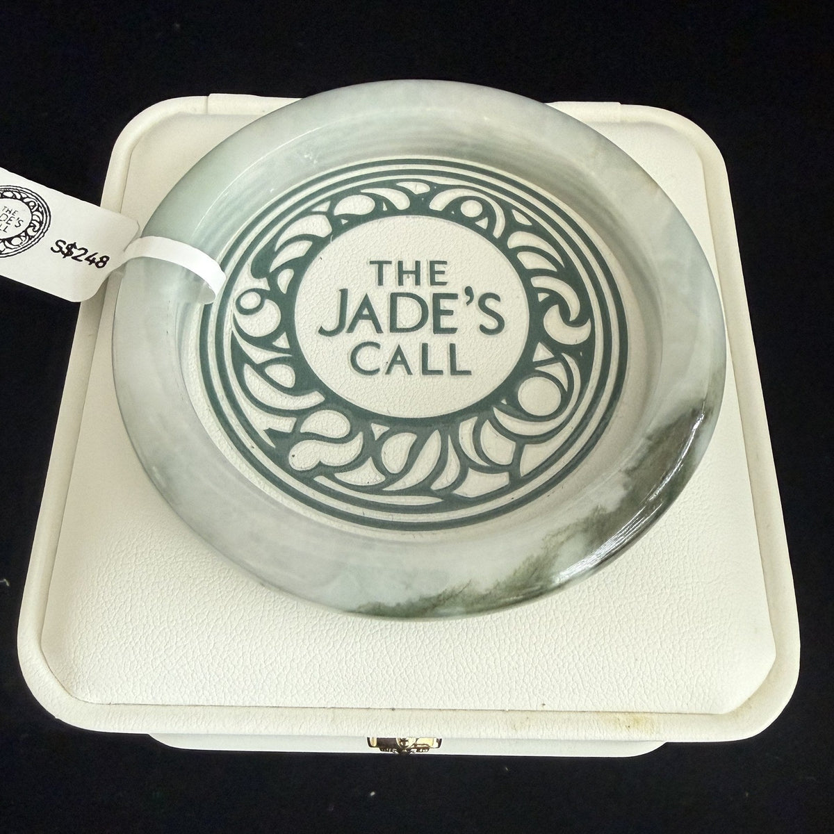 518. Pale celadon with olive green patch jade bangle
