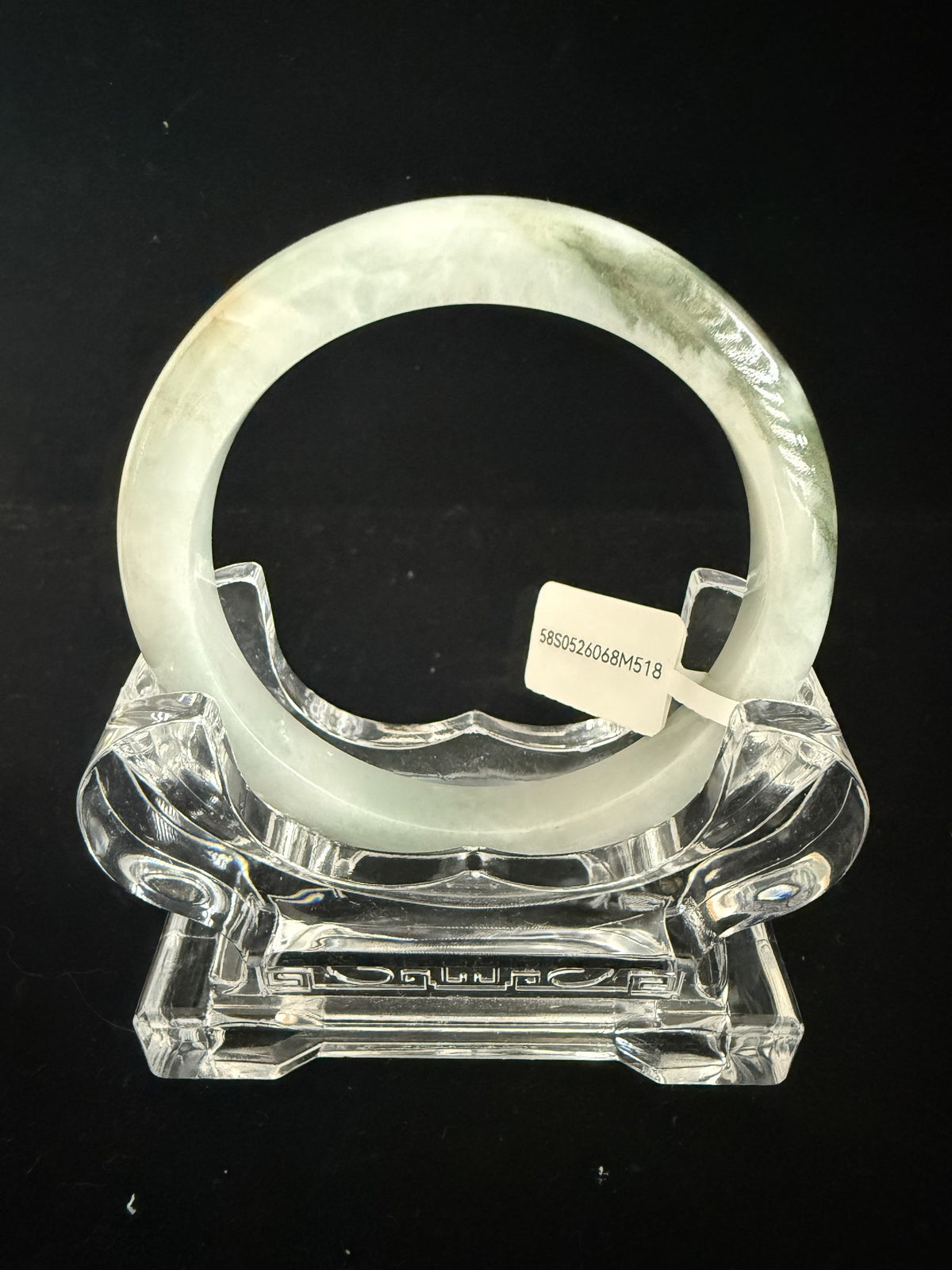 518. Pale celadon with olive green patch jade bangle