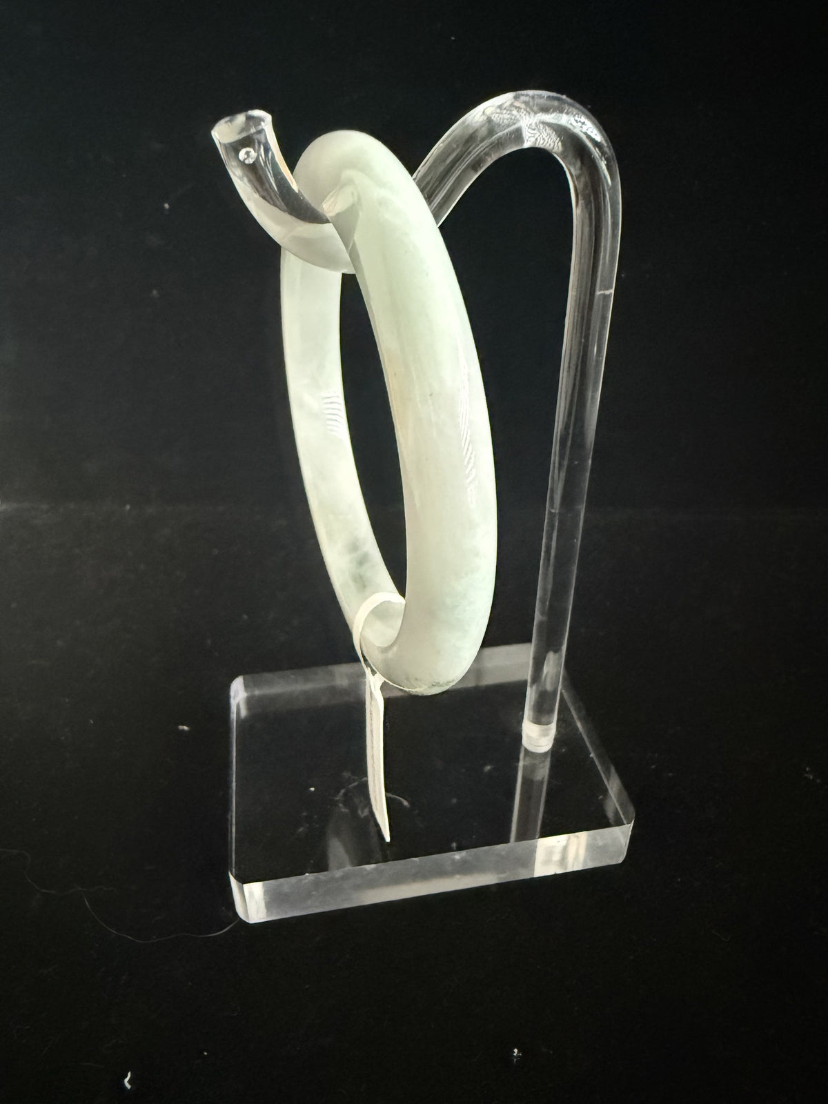 518. Pale celadon with olive green patch jade bangle