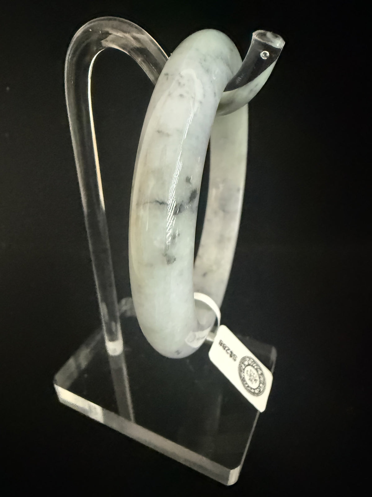 537. White lavender with dark ink flecks jade bangle