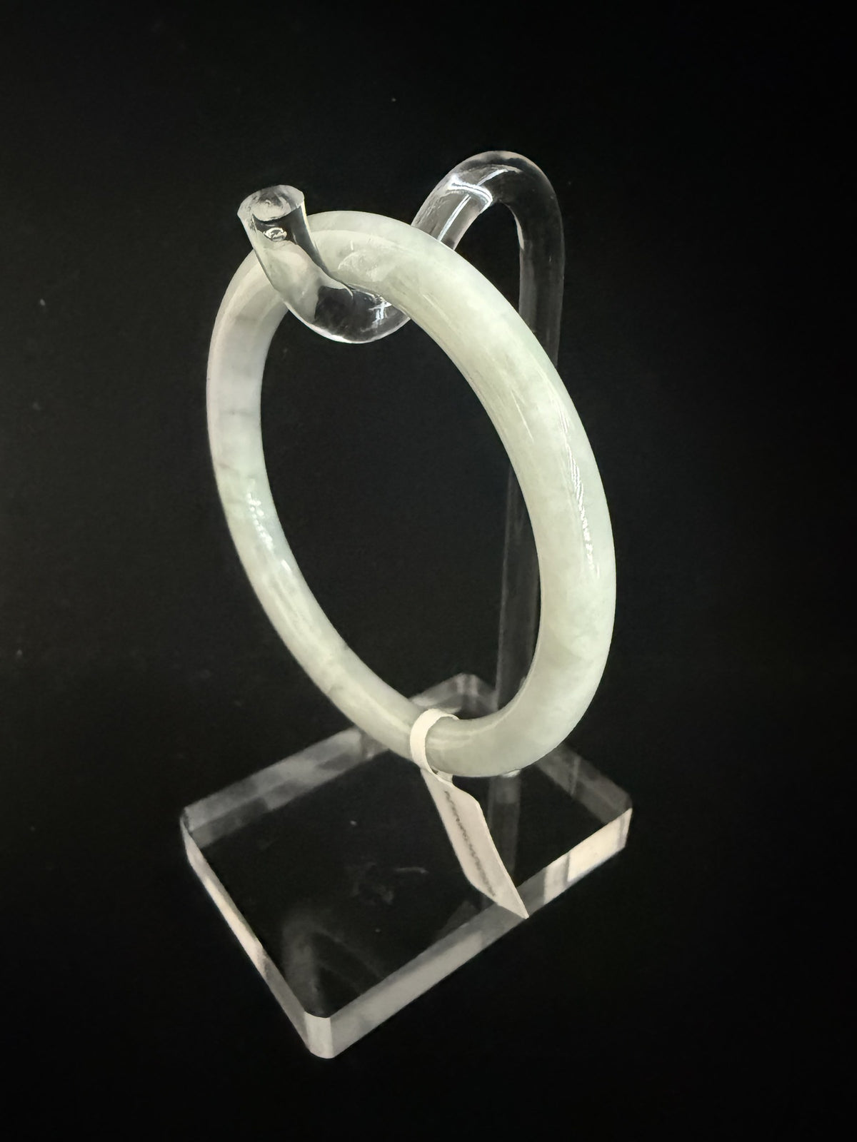 524. Pale celadon white with green vein thin jade bangle