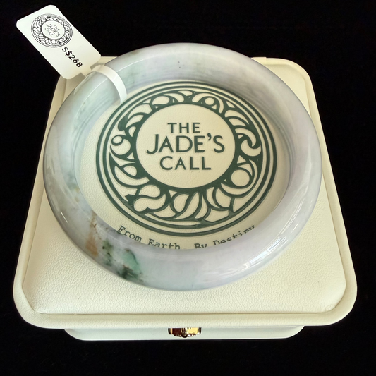 386. Lavender, with streak of green Jadeite Bangle