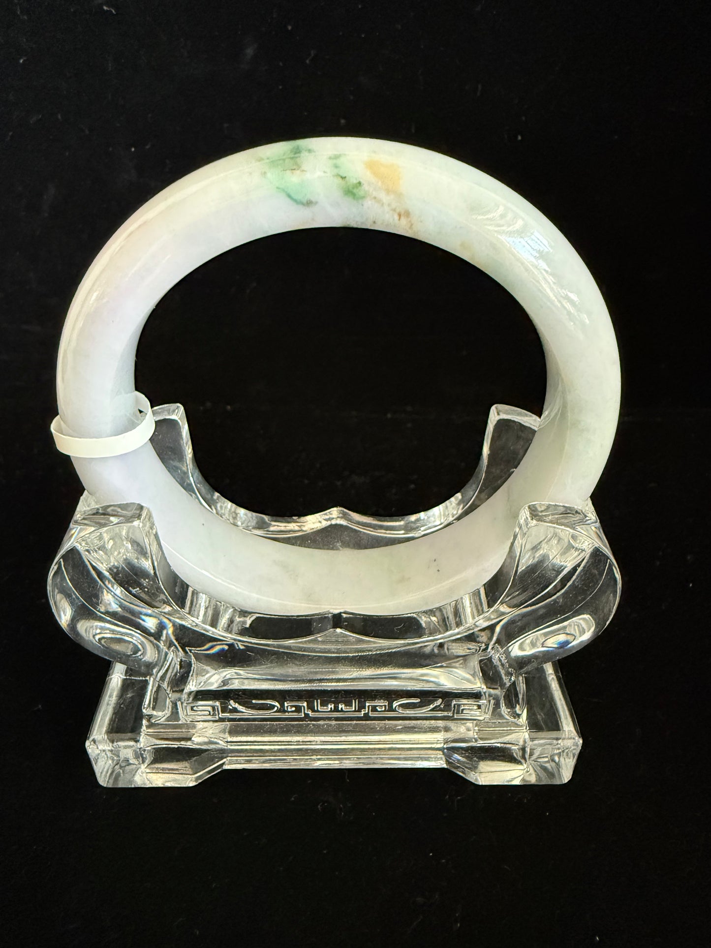 386. Lavender, with streak of green Jadeite Bangle
