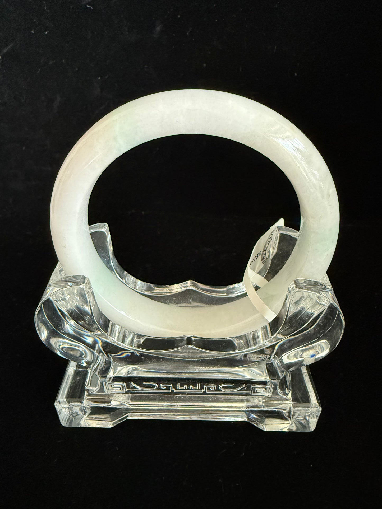 393.  Near white Jadeite  bangle