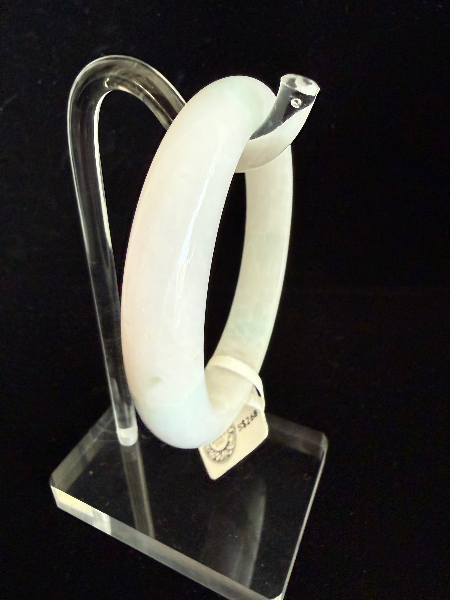393.  Near white Jadeite  bangle