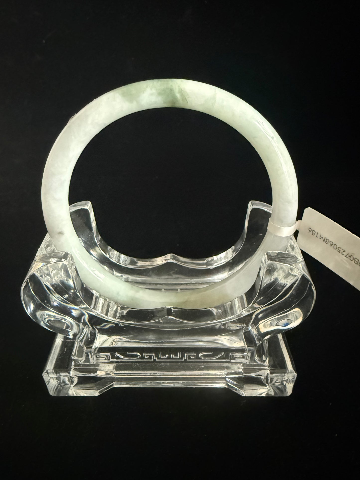 186. Thin white with dashes of green Jade bangle