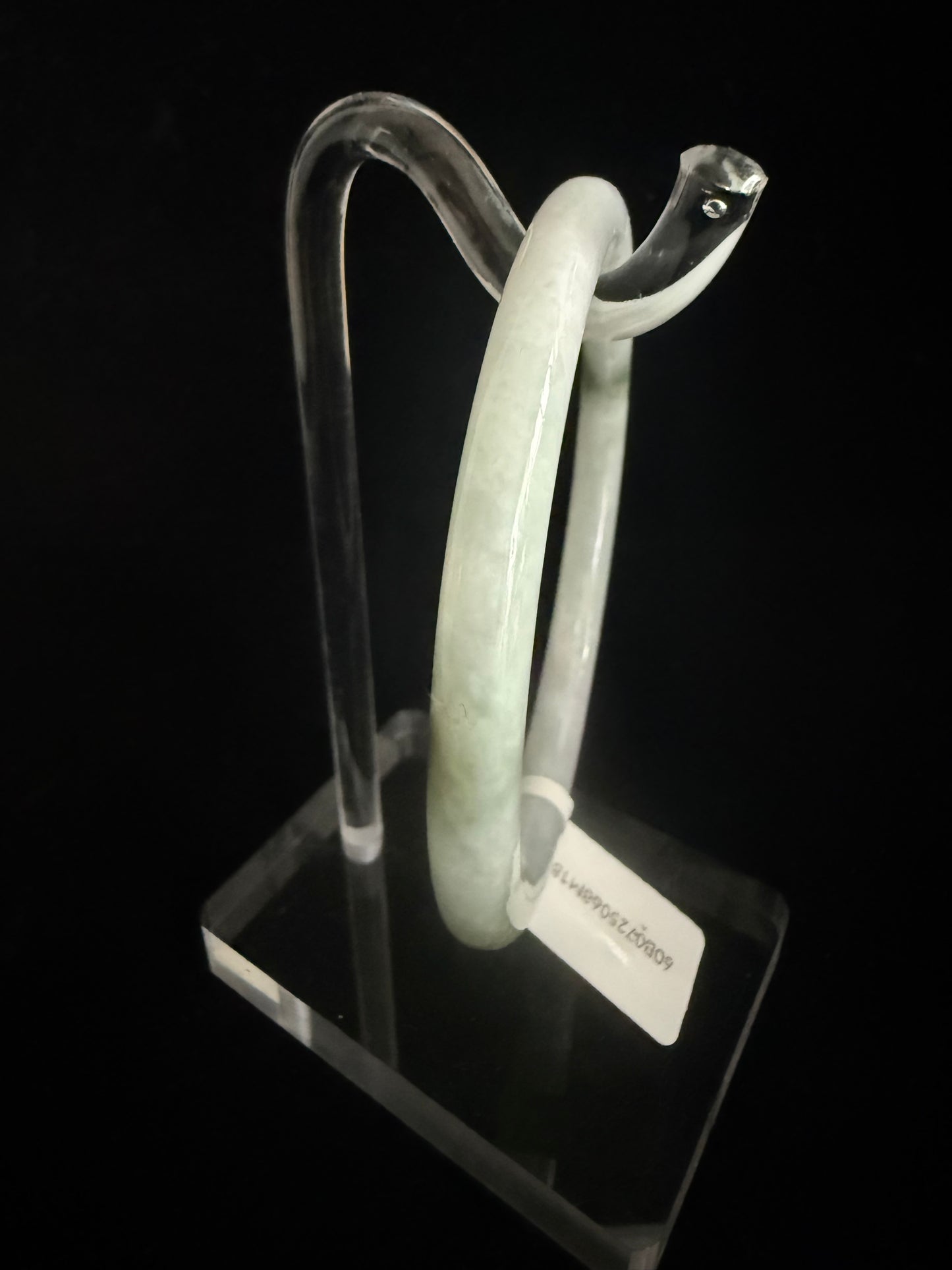 186. Thin white with dashes of green Jade bangle