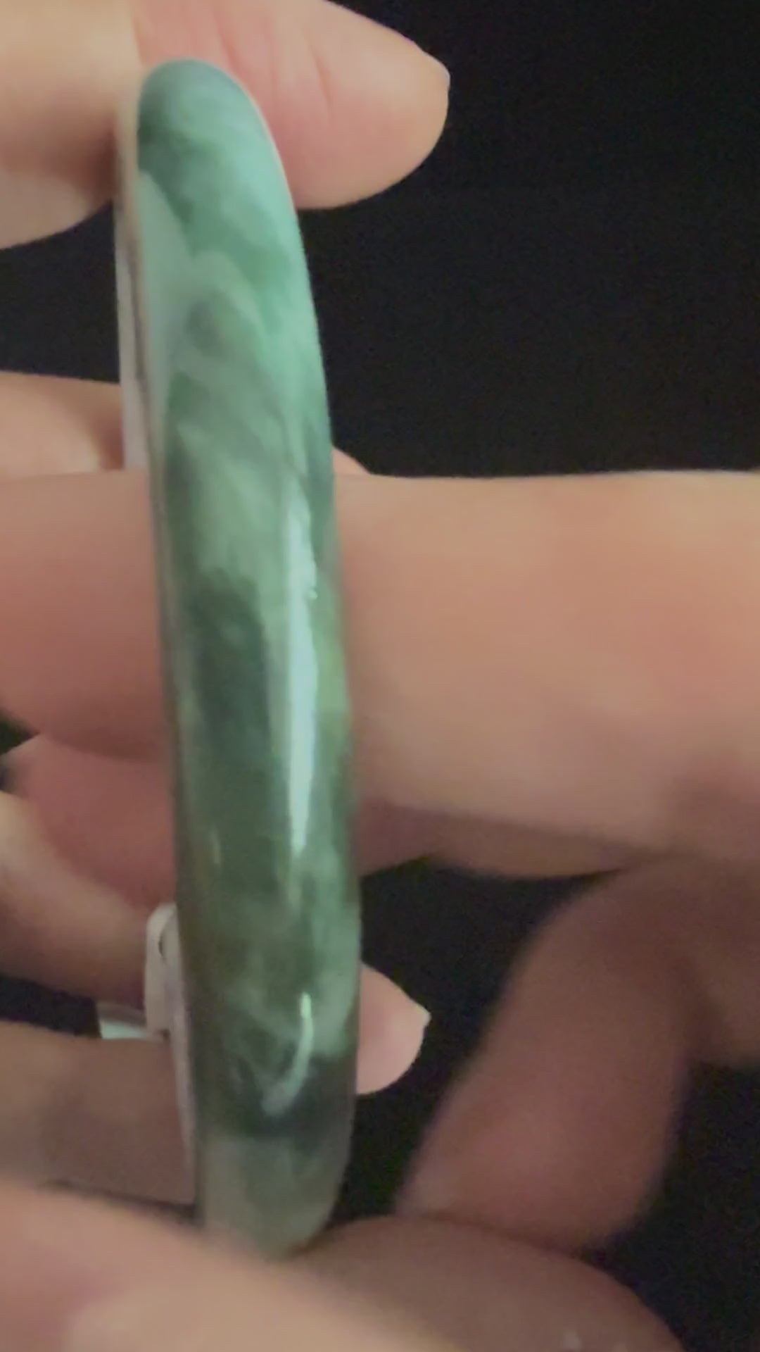 490. White lavender with green patch thin jade bangle video