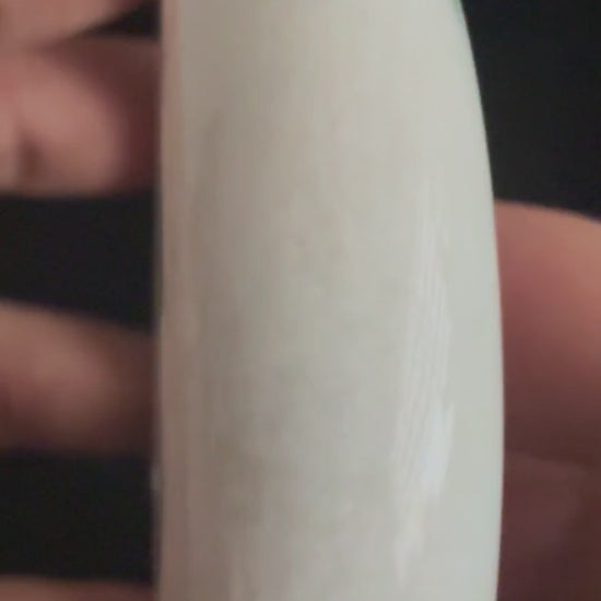489. Milky white with green flecks chunky jade bangle video