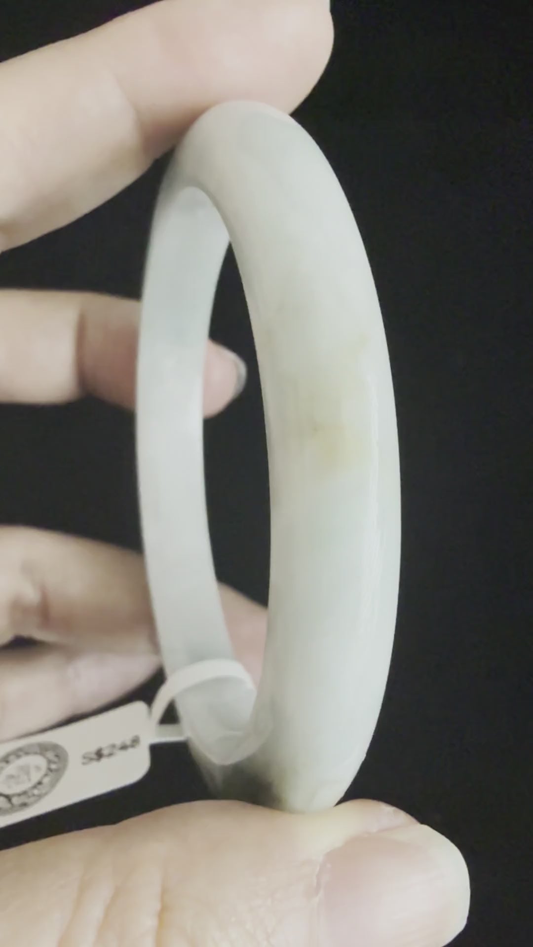 518. Pale celadon with olive green patch jade bangle video