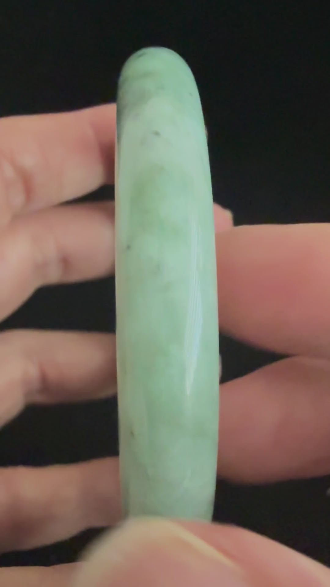 485. Deep grey-green mottled jade bangle video